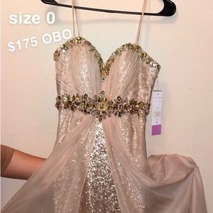 Brand new with tags size 0. retails for over $300! Great for Hoco or prom